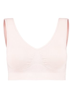 Soutien-gorge seamless rose clair avec de larges bretelles, un design en V et une texture côtelée subtile. Doté d'un bandeau élastique doux avec l'étiquette "MAGIC".