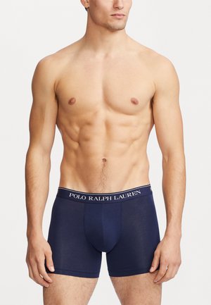 Bóxer navy de mezcla de algodón, con una cintura elástica de marca, diseño ajustado y textura suave.