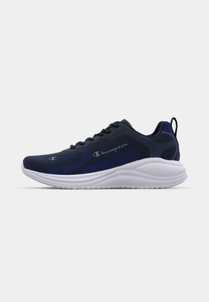 Navy athletic shoe with a smooth synthetic upper, white cushioned sole, prominent branding, and textured accents along the sides.