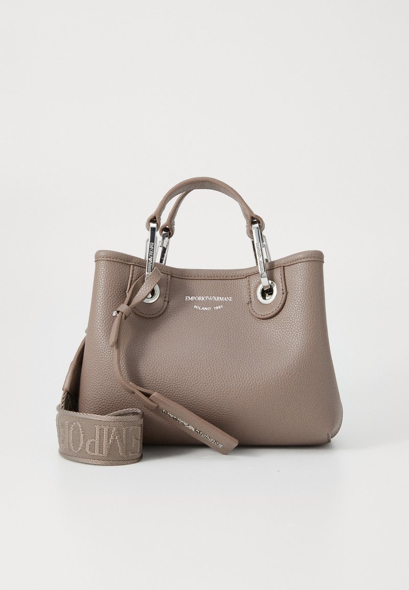 Brown textured leather handbag with silver hardware. Features dual handles, a detachable strap, and brand logo embossed on the front.