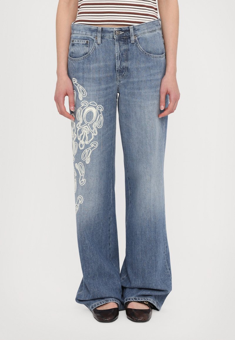 Wide-leg blue denim jeans featuring white embroidered detailing on the left side. Mid-rise waist with a classic five-pocket design.