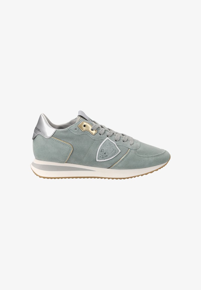Mint green suede sneaker with silver accents, white stitching, and a rubber sole. Features a triangular side logo and lace-up design.