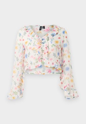 Floral crop top in lightweight fabric. Features ruffled neckline and sleeves. Predominant colors include white, pink, yellow, and blue.