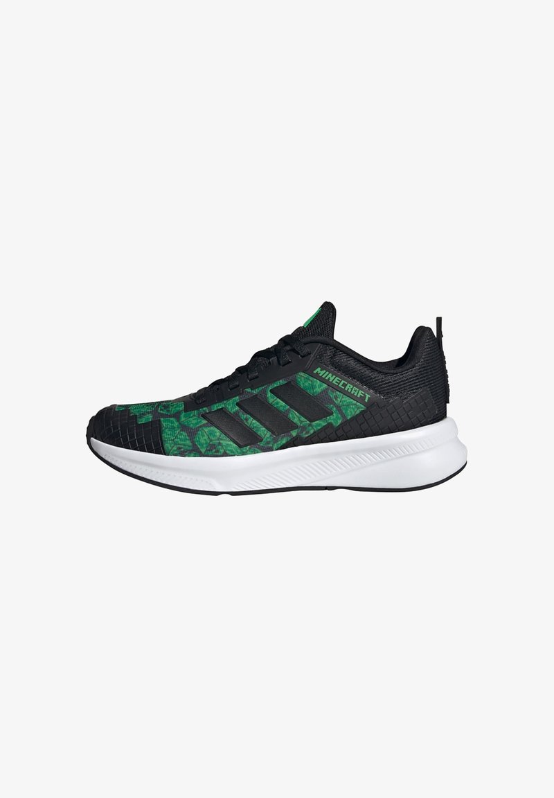 Black and green athletic shoes with a mesh upper, textured sides, and white sole featuring a Minecraft logo and distinct geometric pattern.