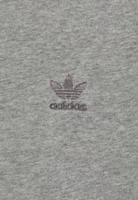 Gray cotton fabric with a soft texture featuring a dark purple embroidered Adidas logo and trefoil design in the center.