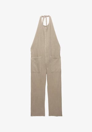 Beige haalaria, joka on valmistettu pehmeästä kankaasta, jossa on kaula-aukko-tyyli, kaksi etutaskua ja suorat lahkeet.