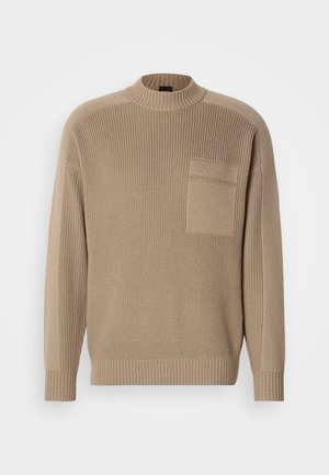 Beige knitted sweater with long sleeves, ribbed collar and cuffs, and a patch pocket on the left chest.