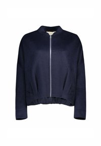 Giacca bomber blu navy realizzata in un materiale morbido, con zip frontale, colletto rotondo e fondo a coste con arricciatura elastica.