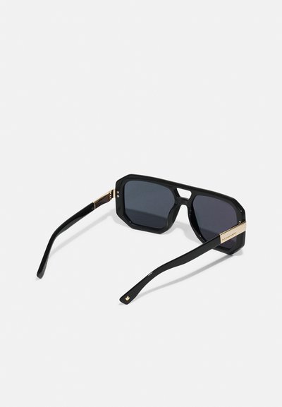 Black octagonal sunglasses with dark lenses, featuring gold accents on the temples and a glossy finish on the frame.