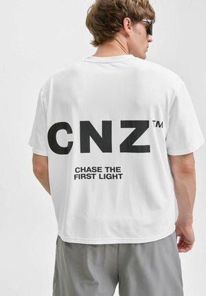 Jack & Jones Performance JCOCNZ BERLIN - T-shirt print - bright white