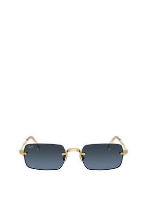 Lenti rettangolari con tinta nera, montatura dorata senza cerchi e aste dorate trasparenti, con logo Ray-Ban sulla lente sinistra.