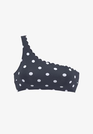 Czarny bikini top na jedno ramię w białe grochy z falbankowymi krawędziami na linii dekoltu i pasku.