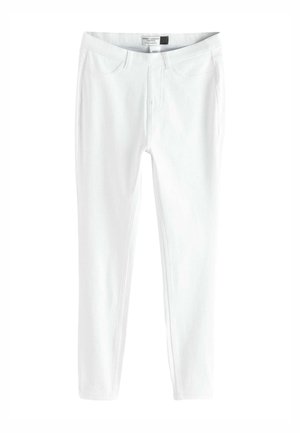 Weiße, kurz geschnittene Jersey-Leggings mit Fronttaschen und Gürtelschlaufen, entworfen für eine schlanke Passform und lässigen Tragekomfort.