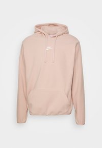 Felpa con cappuccio rosa realizzata in materiale morbido, con tasca frontale, cappuccio con coulisse e logo Nike bianco sul petto. Vestibilità standard con maniche lunghe.
