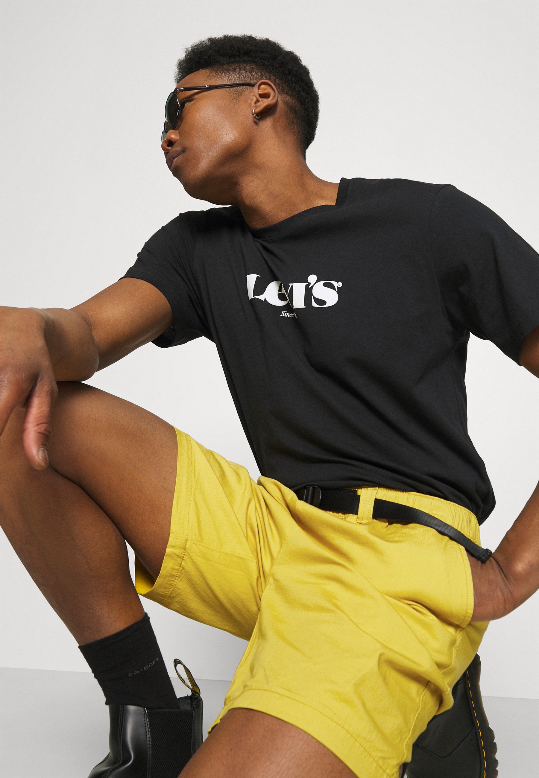 yellow levi shorts