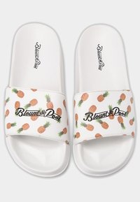 White slides featuring a textured strap decorated with orange pineapples and green foliage, with "Blount & Pool" in black script.