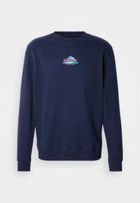 Sötétkék pulóver pamut keverék anyagból, kerek nyakkivágással. "tommy" logóval és türkiz-kék valamint fehér színű hegy grafikával díszítve. Bordázott mandzsettákkal.