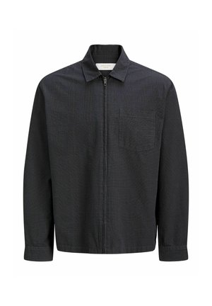 Veste noire zippée avec un motif à carreaux subtil, une poche poitrine, un col et des manches longues.