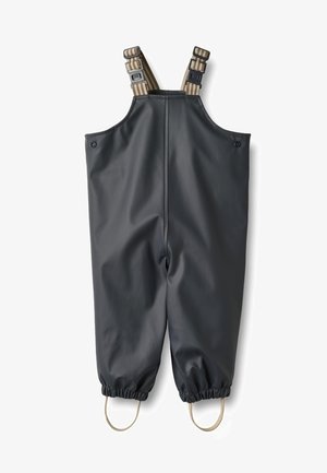 Schwarzer wasserdichter Overall mit verstellbaren braun gestreiften Trägern, elastischen Bündchen an den Knöcheln und zwei seitlichen Knopfverschlüssen.