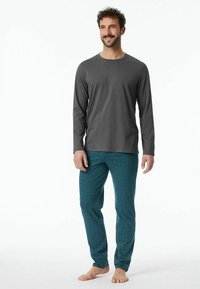 Gray long-sleeve shirt and teal patterned pants made of soft fabric. The pants feature a subtle swirling design and an elastic waistband.
