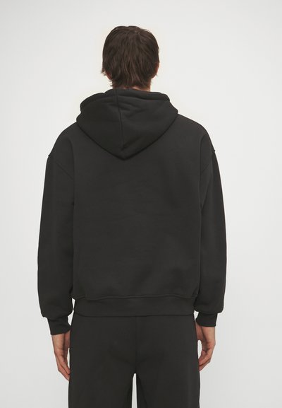 Han Kjøbenhavn DAILY UNISEX - Pusa - black