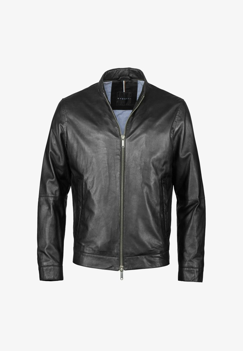 Must must nahkjope, millel on püsti kaelus, esi tõmblukk ja ühtlane tekstuur. Omab pika varrukaga ja minimalistlikke disainielemente.