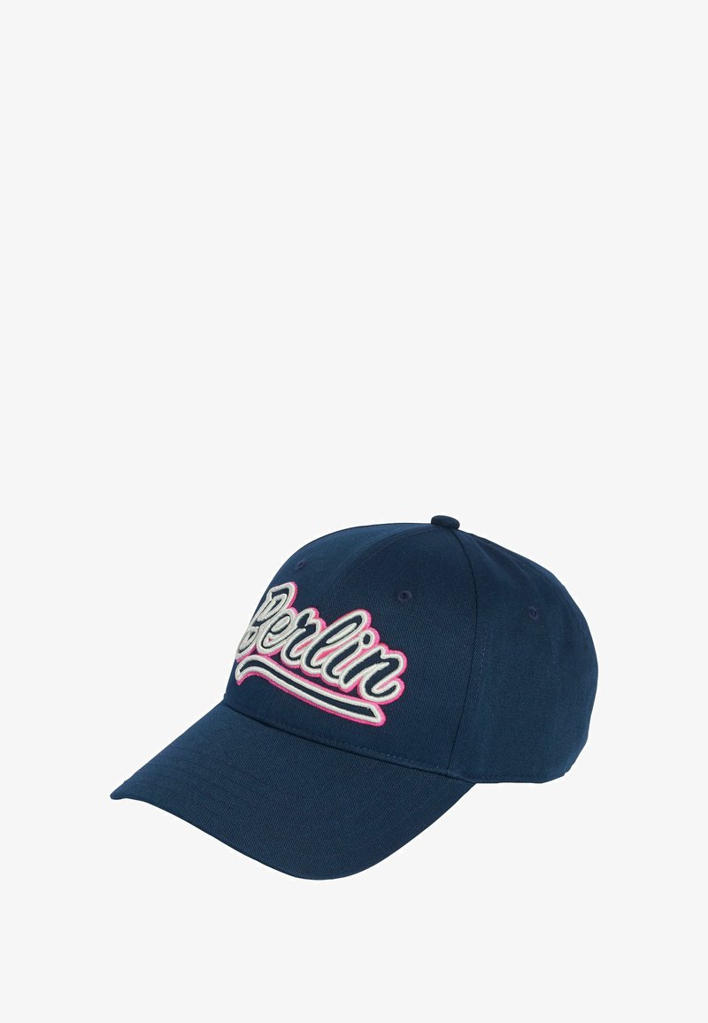 Navy blue cap with a curved brim, features embroidered "Berlin" in white and pink, cotton material, six-panel construction, and ventilation holes.