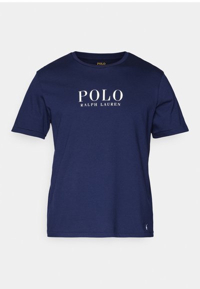 Jūras zilas krāsas īsām piedurknēm T-krekls, izgatavots no kokvilnas, ar baltu "POLO RALPH LAUREN" logotipu uz priekšpuses un apaļu kakla izgriezumu.