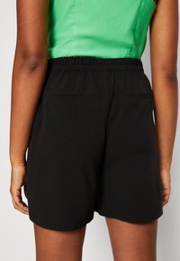 YAS YASHELEN - Shorts - black