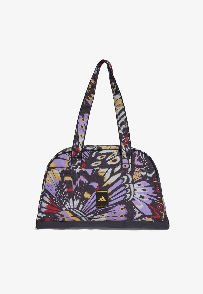 Bolsa de tela con un diseño de mariposas en morado, negro y amarillo. Presenta asas dobles y una base de color sólido. Logo de marca en negro en la parte frontal.
