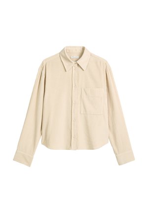 Beige Kordhose langärmliges Hemd mit Frontknöpfen, einer Brusttasche, spitzem Kragen und Knopfmanschetten, auf einem weißen Hintergrund präsentiert.
