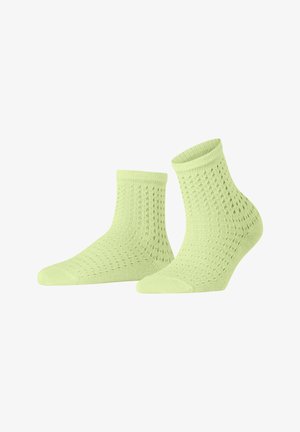 Lindgrüne Knöchelsocken mit einem strukturierten, offenen Strickmuster, geripptem Bündchen und verstärktem Zehenbereich für Langlebigkeit. Geeignet für legere Trageanlässe.