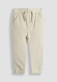 Helle beige Baumwollmischung-Jogginghosen mit elastischem Taillenbund, Kordelzug, Seitentaschen und Bündchen an den Knöcheln. Weicher Stoff mit meliertem Finish.