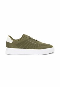 Olive green knitted low-top sneaker with white sole, lace-up design, and small Tommy Hilfiger logo on side.