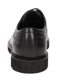 Chaussures en cuir noir avec une texture lisse, un bout arrondi et une semelle en caoutchouc durable. Comprend des détails de couture sur le talon et les côtés.