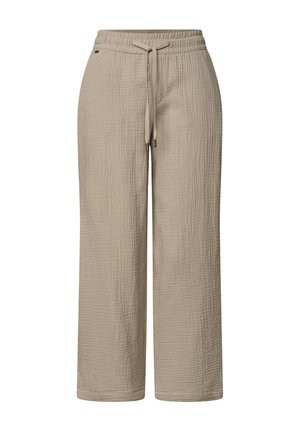 Pantalon beige à jambes larges en tissu texturé, taille élastique et fermeture ajustable par cordon à l'avant.