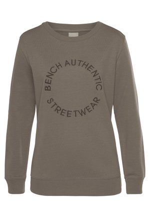 Sweat-shirt marron à manches longues avec col rond, poignets et ourlet côtelés, avec un texte circulaire "Bench Authentic Streetwear" à l'avant.