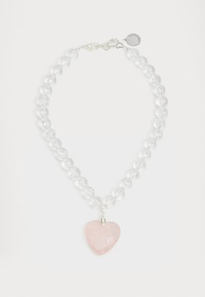 Necklace featuring transparent round beads, silver hardware, and a pink heart-shaped pendant with a faceted surface.