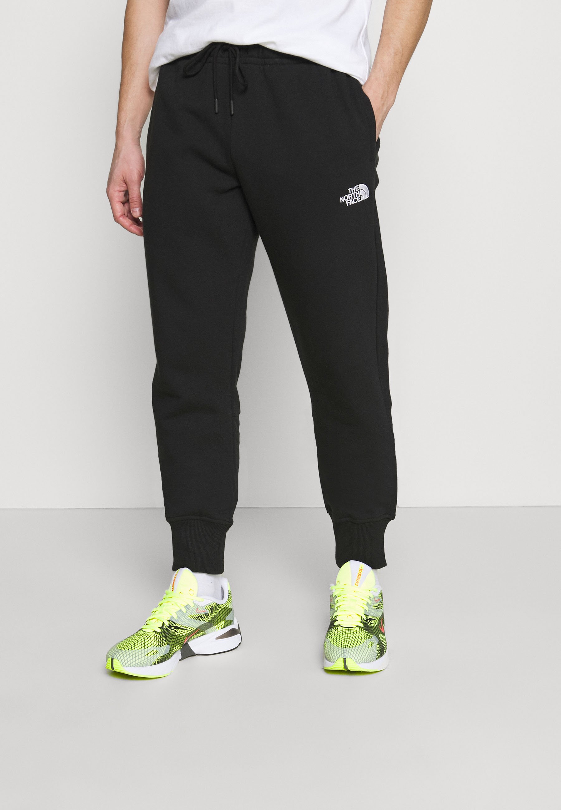 the north face tnl joggers in black