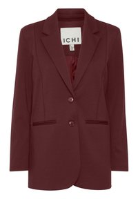 Blazer bordeaux au design ajusté, boutonnage simple avec deux boutons, poches latérales, et revers crantés en tissu doux.
