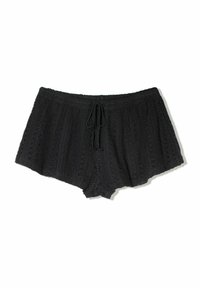 Black, woven shorts with a loose fit, featuring a drawstring waistband and intricate eyelet patterns throughout the fabric.