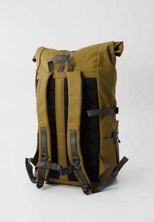 Roll-top backpack in olive green nylon, featuring a black padded back, adjustable straps, and side mesh pockets for storage convenience.