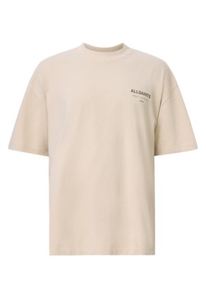 Beige pamut póló, kerek nyakkivágással és esett vállakkal. A bal oldalon egy kis fekete "ALLSAINTS" logo található.