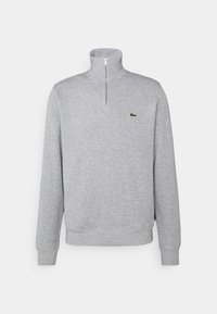 Gray zip-neck sweatshirt, soft fabric, long sleeves, ribbed cuffs and hem, featuring a small green logo on the chest.