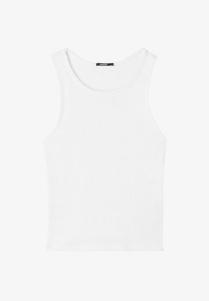 Débardeur blanc sans manches en maille côtelée avec encolure ronde et étiquette de la marque à l'arrière du col intérieur.