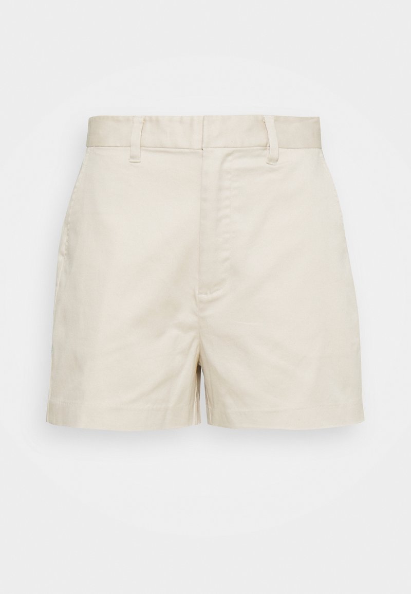 Shorts en coton beige taille haute avec passants de ceinture, poches latérales et fermeture dissimulée à l'avant, présentés sur un fond blanc.