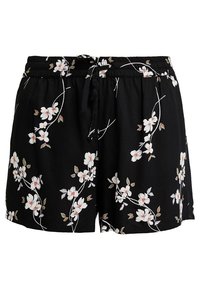 Svarta shorts tillverkade av mjukt tyg med ett blommönster i vitt och beige, med resårmidja och justerbar dragsko.