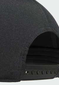 Black cap with a smooth texture, curved brim, and adjustable plastic snap closure featuring multiple holes for sizing.