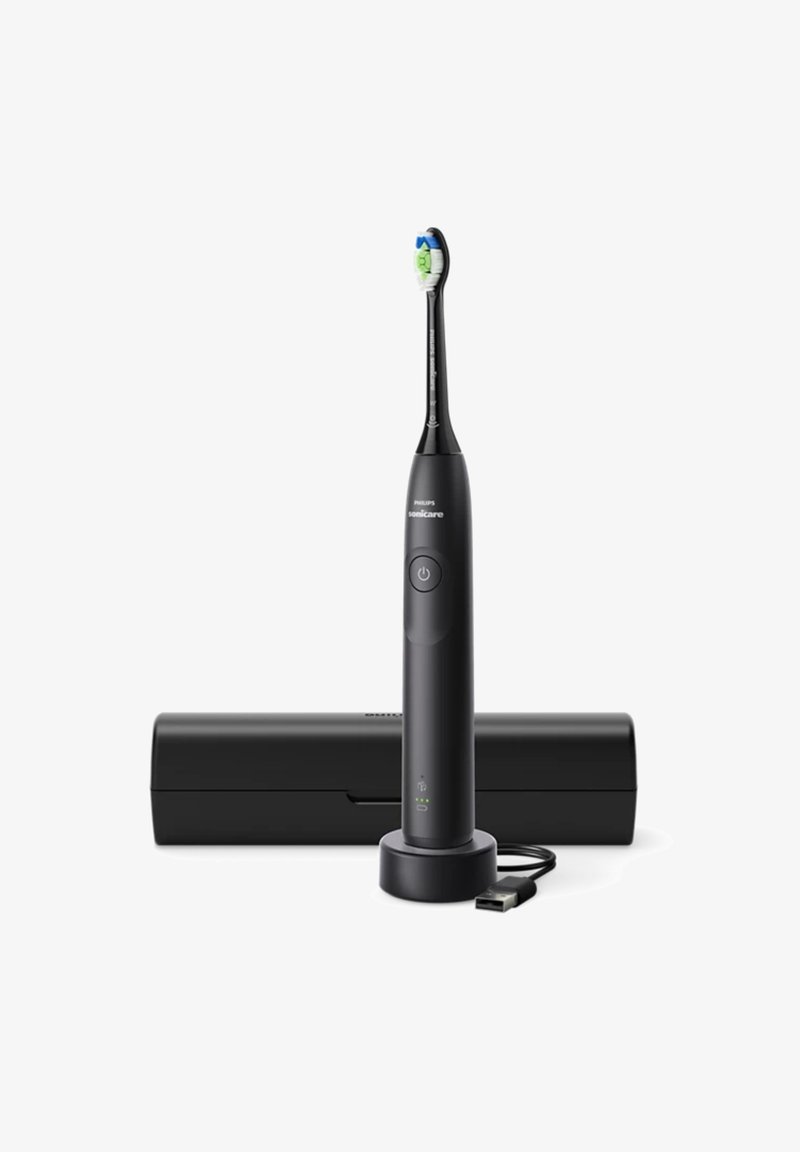 Spazzolino elettrico nero con un testina di setole verde e blu, una base di ricarica e una custodia da viaggio elegante. Presenta un pulsante di accensione e lucciole di indicazione.