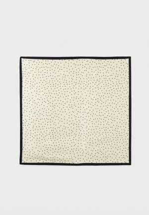 Cream square scarf with small black polka dots and a thin black border laid flat on a white background.